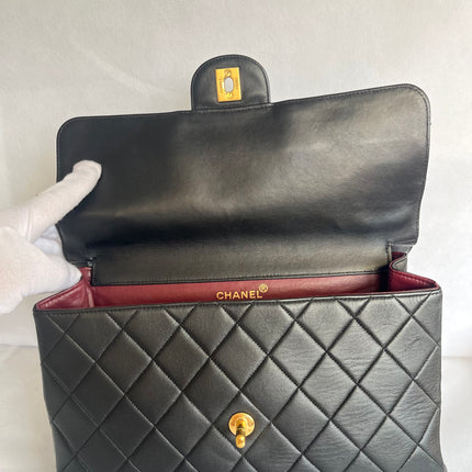 Chanel Jumbo Double Sided Classic Flap Black Lambskin Leather 24k Gold Hardware Handbag