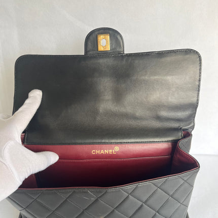 Chanel Jumbo Double Sided Classic Flap Black Lambskin Leather 24k Gold Hardware Handbag