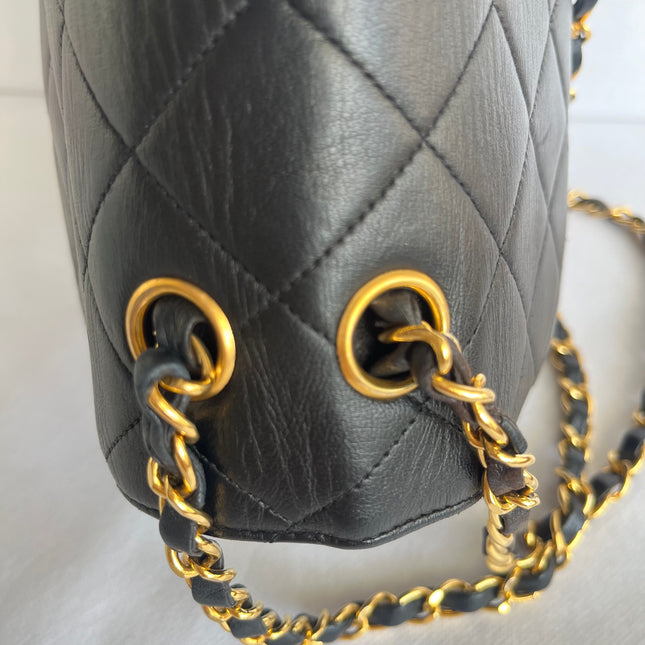 Chanel Jumbo Double Sided Classic Flap Black Lambskin Leather 24k Gold Hardware Handbag