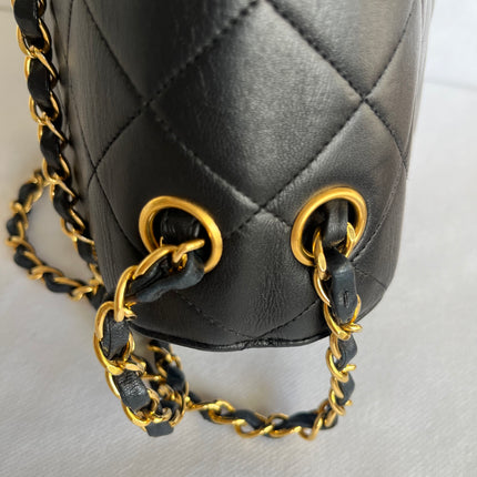 Chanel Jumbo Double Sided Classic Flap Black Lambskin Leather 24k Gold Hardware Handbag