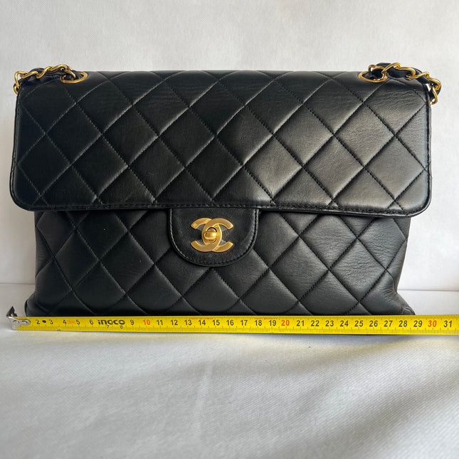 Chanel Jumbo Double Sided Classic Flap Black Lambskin Leather 24k Gold Hardware Handbag