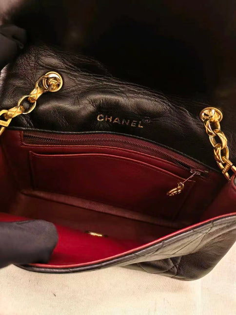 Sac à rabat Chanel Diana Mini en cuir noir avec chaîne Bijou