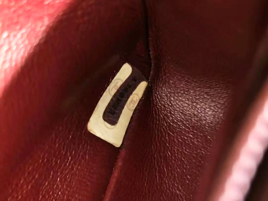 Sac à rabat Chanel Diana Mini en cuir noir avec chaîne Bijou