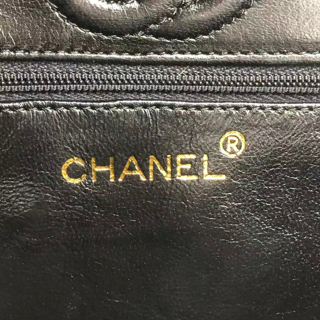 Chanel Vintage Octagon Small Quilted Black Lambskin Leather Gold Hardware Crossbody Bag