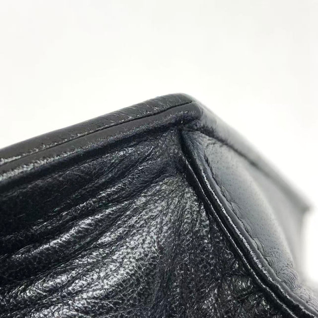 Chanel Vintage Octagon Small Quilted Black Lambskin Leather Gold Hardware Crossbody Bag