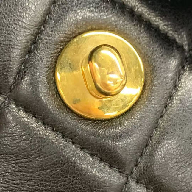 Chanel Vintage 1994-1996 Duma Backpack Black Lambskin Leather Gold Hardware