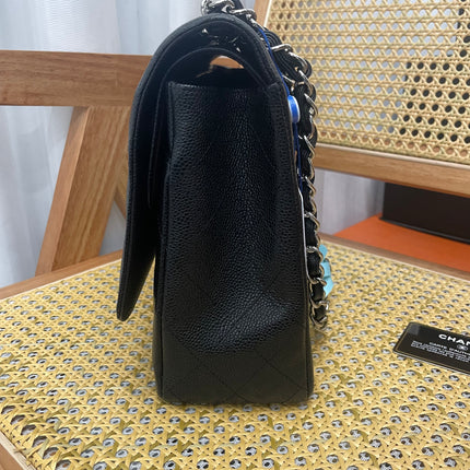 Chanel Classic Flap Maxi 2011 cuir caviar noir double rabat avec finitions dorées