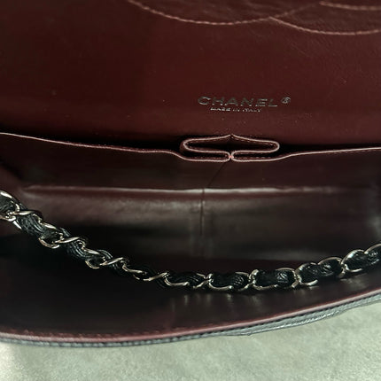 Chanel Classic Flap Maxi 2011 cuir caviar noir double rabat avec finitions dorées