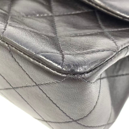 Chanel Vintage Classic Flap Petit Agneau Noir Double Rabat Quincaillerie Or 24 carats