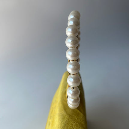 Sac bandoulière pochette Chanel 22p Mini en agneau matelassé blanc