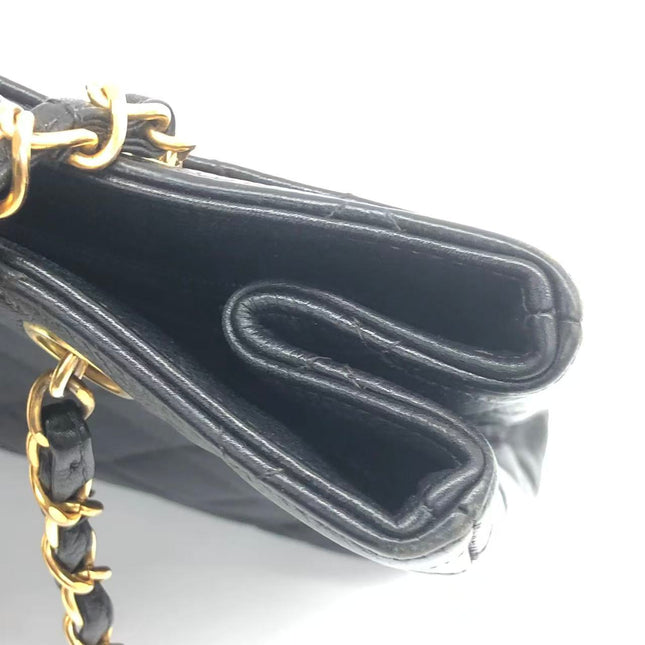 Chanel Wallet on Chain Classique rabat en cuir grainé noir, finition argentée