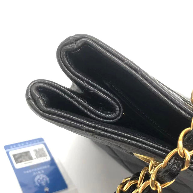 Chanel Wallet on Chain Classique rabat en cuir grainé noir, finition argentée