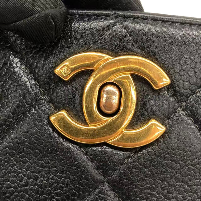 Chanel Wallet on Chain Classique rabat en cuir grainé noir, finition argentée