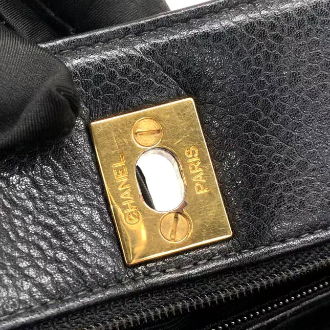 Chanel Wallet on Chain Classique rabat en cuir grainé noir, finition argentée