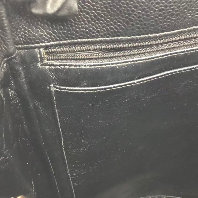 Chanel Wallet on Chain Classique rabat en cuir grainé noir, finition argentée