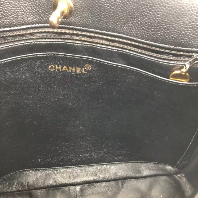 Chanel Wallet on Chain Classique rabat en cuir grainé noir, finition argentée