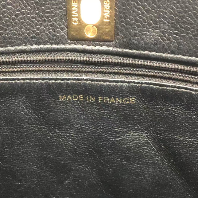 Chanel Wallet on Chain Classique rabat en cuir grainé noir, finition argentée