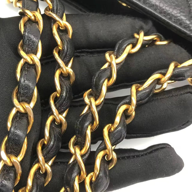 Chanel Wallet on Chain Classique rabat en cuir grainé noir, finition argentée