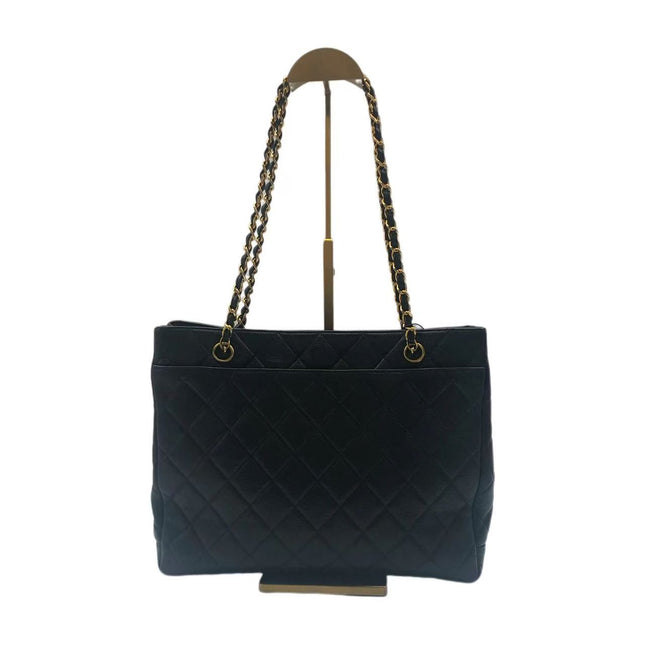 Chanel Wallet on Chain Classique rabat en cuir grainé noir, finition argentée