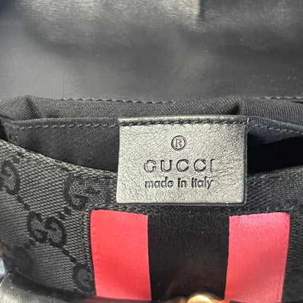 Sac bandoulière clouté en cuir de serpent noir et doré Gucci Horsebit 1955 Small