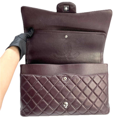 Chanel Classique Grand Modèle Noir Cuir Caviar Double Rabat Métal Argenté