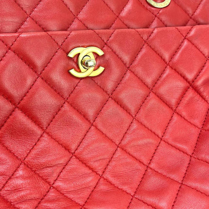 Sac cabas Chanel Grand Shopping Tote en cuir caviar bordeaux, taille GM, finitions argentées