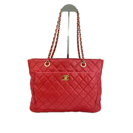 Sac cabas Chanel Grand Shopping Tote en cuir caviar bordeaux, taille GM, finitions argentées