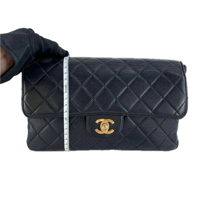 Sac à main Chanel Jumbo Double Sided Classic Flap en cuir d'agneau noir avec garnitures en or 24 carats
