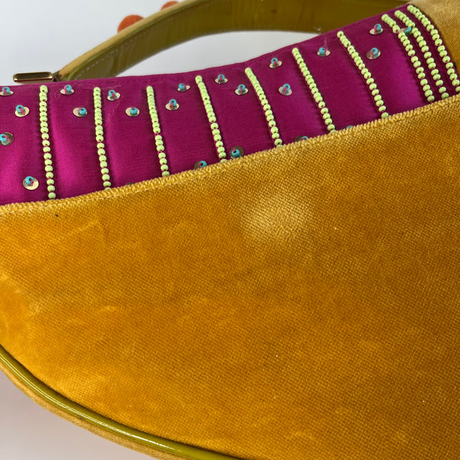 Sold Limited Edition John Galliano era Dior Saddle bag with pompom and bead