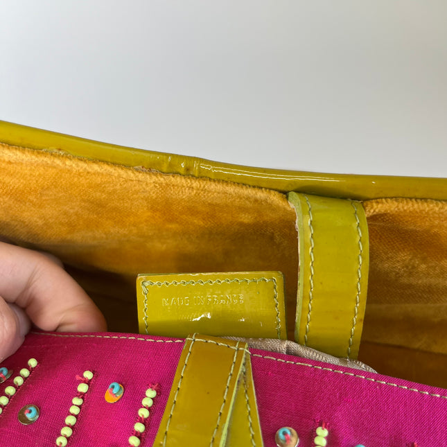 Sold Limited Edition John Galliano era Dior Saddle bag with pompom and bead