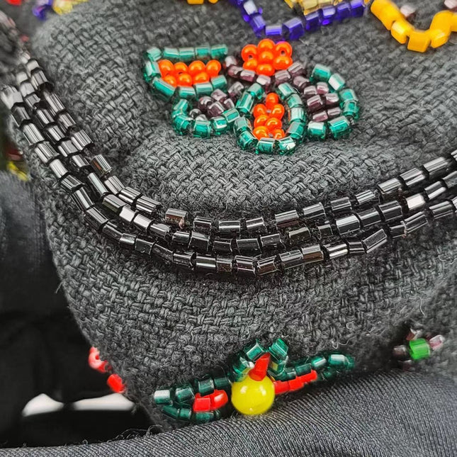 Sold FENDI Baguette Black Canvas with beaded Flower Embroidery