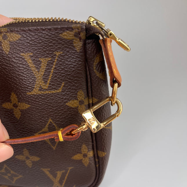Sold Louis Vuitton pochette accessoires classic brown