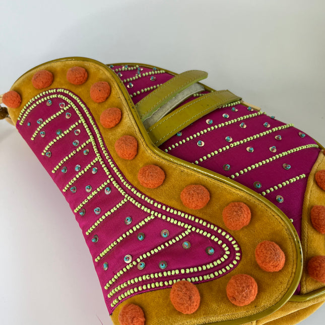 Sold Limited Edition John Galliano era Dior Saddle bag with pompom and bead