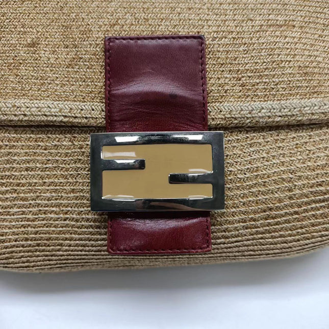 Sold Fendi Baguette Straw Raffia bag with leather lining