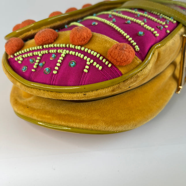 Sold Limited Edition John Galliano era Dior Saddle bag with pompom and bead