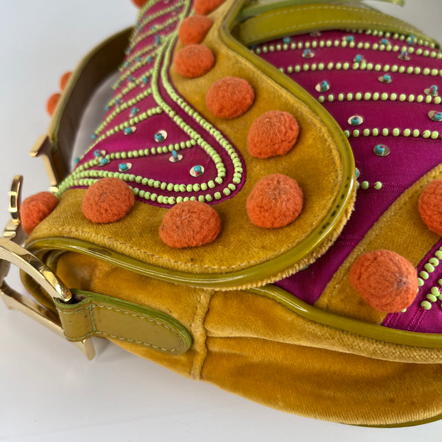 Sold Limited Edition John Galliano era Dior Saddle bag with pompom and bead