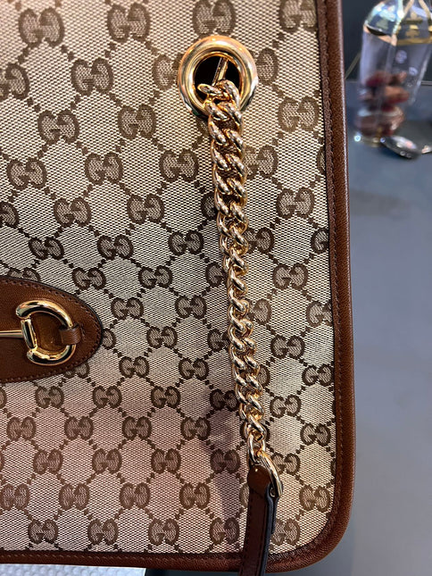 Sold Gucci 1956 horsebit chain tote in monogram canvas and brown leather
