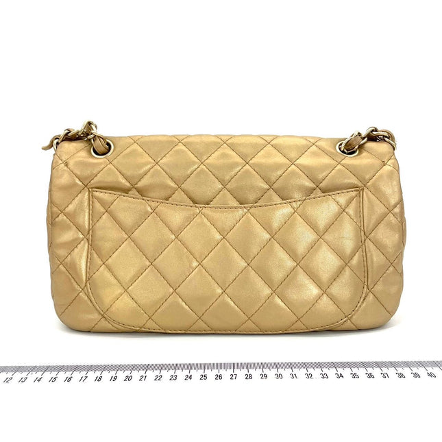 Sold Chanel Timeless/ Classic Flap Medium Gold Gem CC Turn lock