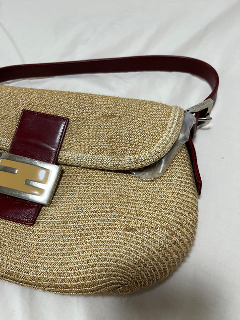 Sold Fendi Baguette Straw Raffia bag with leather lining