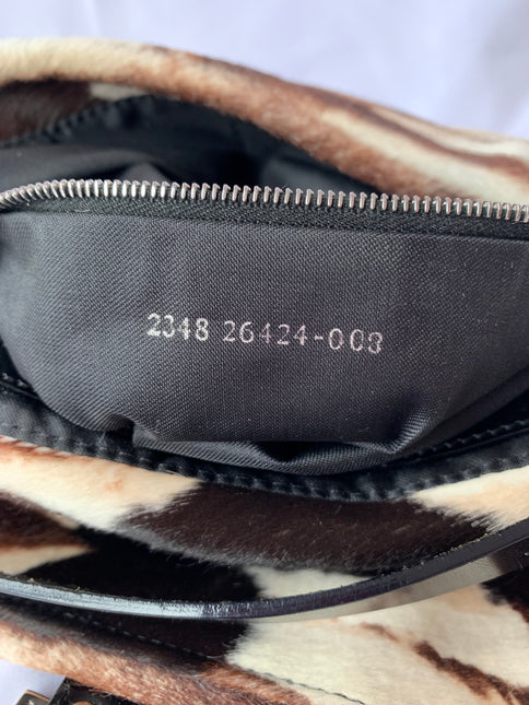 Sold Fendi Baguette Shoulderbag Ponyhair calfskin with metal plates
