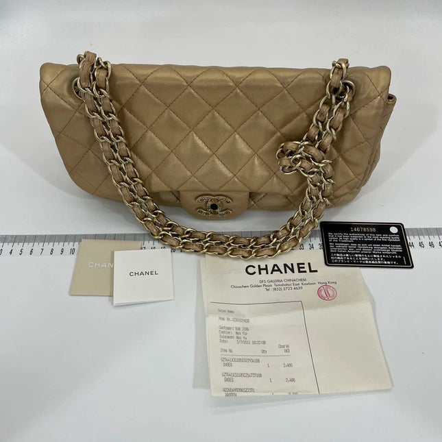 Sold Chanel Timeless/ Classic Flap Medium Gold Gem CC Turn lock