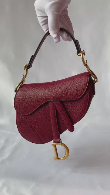 Sold Dior Saddle bag red grain leather mini size with strap