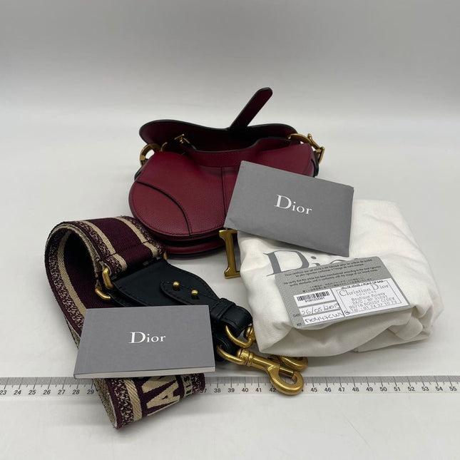 Sold Dior Saddle bag red grain leather mini size with strap