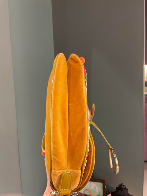 Sold Limited Edition John Galliano era Dior Saddle bag with pompom and bead