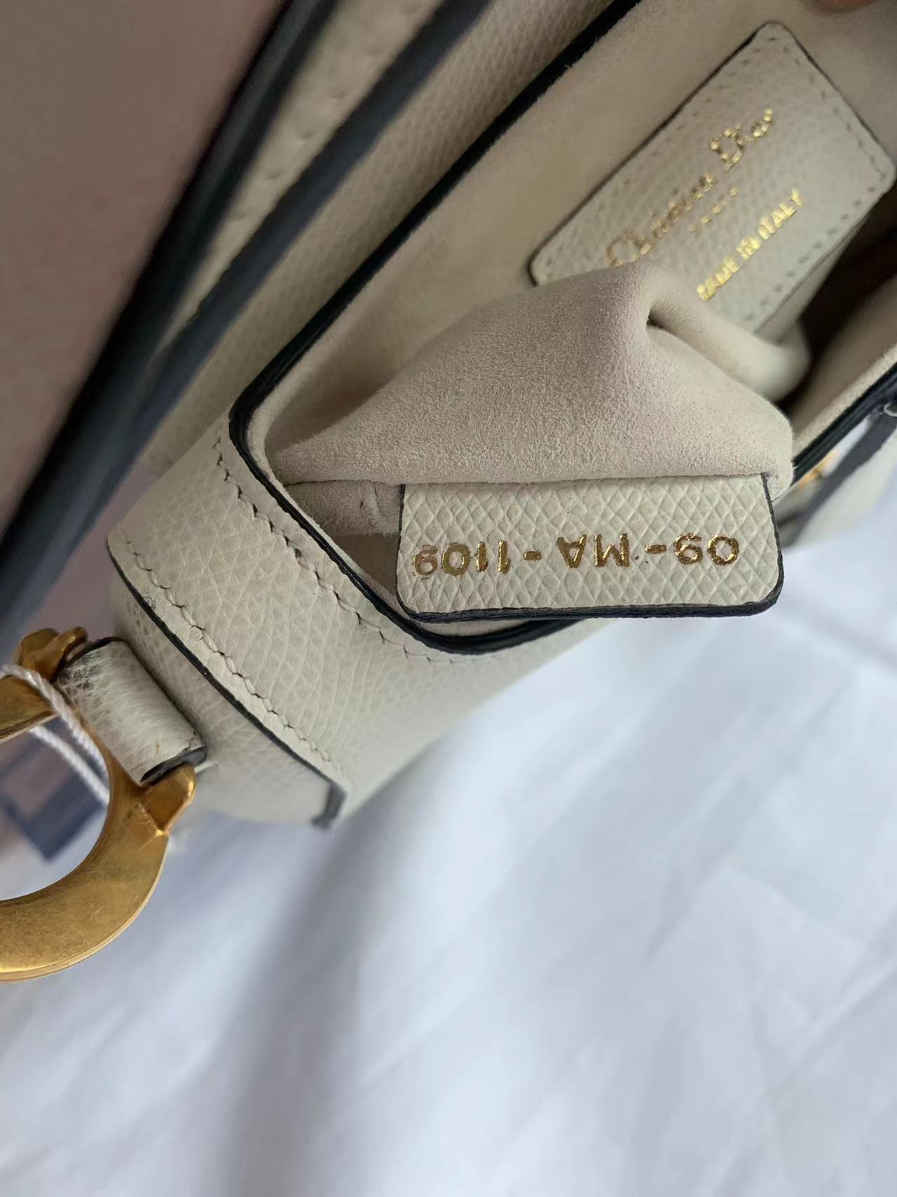Dior Saddle bag white grain leather mini date code